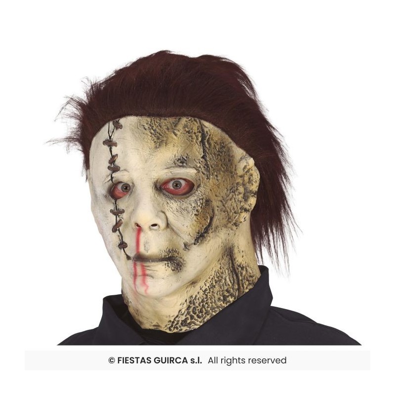 MASQUE LATEX AVEC CHEVEUX ASSASSIN CUIR ET TRONCONNEUSE MASQUE LATEX AVEC CHEVEUX ASSASSIN CUIR ET TRONCONNEUSE