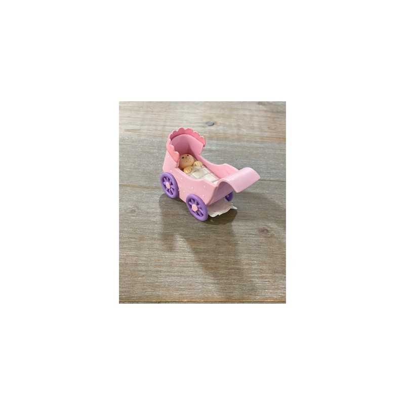 FIGURINE BEBE DANS LANDEAU ROSE